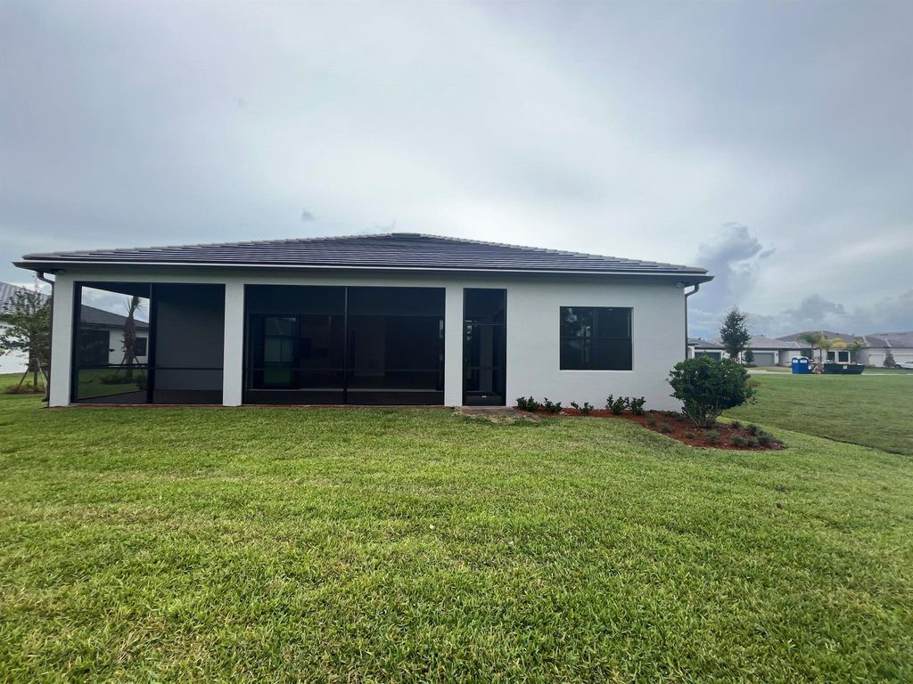 Photo of 333 SE Filoli Drive, Port Saint Lucie, FL 34984 (MLS # R11001933)