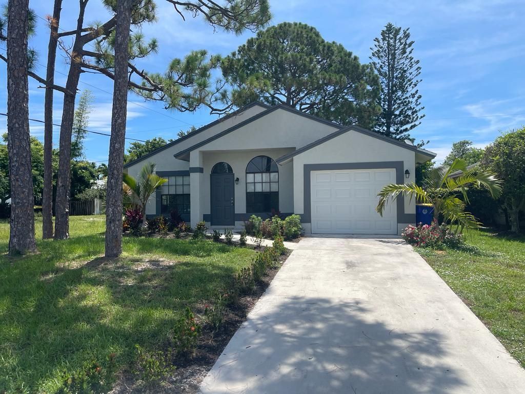 Photo of 5843 SE Mitzi Lane, Stuart, FL 34997 (MLS # R10902255)