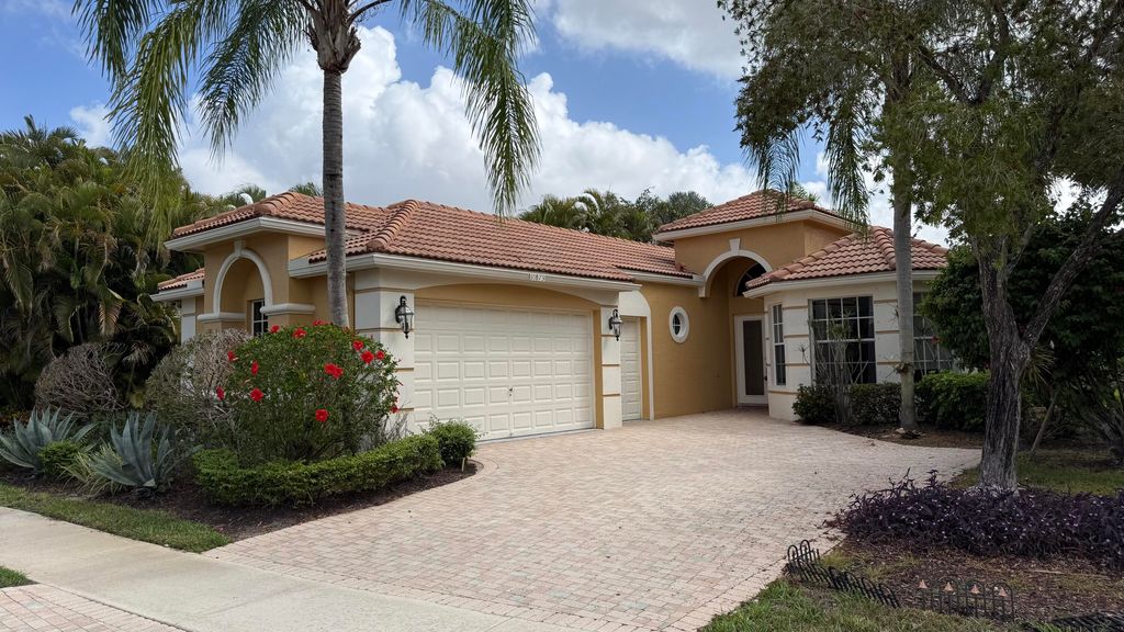 Photo of 10873 Northgreen Drive, Lake Worth, FL 33449 (MLS # B26020383)