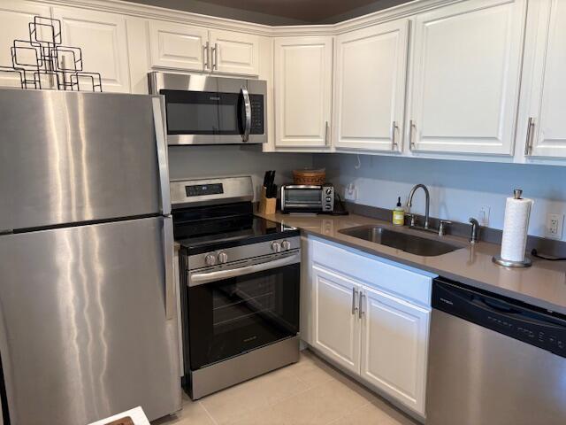 FIRST FLOOR UNIT IN DESIRABLE DORSET SECTION. FULLY UPDATED ONE BEDROOM, ONE BATH UNIT, IN MOVE IN CONDITION. MUST SEE TO BELIEVE. COMPLETELY UPDATED KITCHEN WITH NEW STAINLESS APPLIANCES. UPDATED FULL BATH HAS A WALK IN SHOWER. BEAUTIFULLY FURNISHED WITH WOOD FLOORING THROUGHOUT THE UNIT. A/C INSTALLED IN 2024.WATER VIEW FROM TILED PATIO.