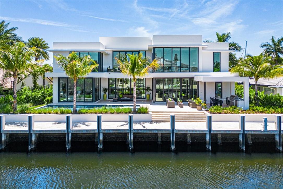 Contemporary Waterfront, Completed November 2022, Furnished, 7500 total sq foot, 6 bedroom, 6 full baths, 2 half baths, expansive 11 and 12 ft custom impact windows, Pivot entry door, Italkraft chef kitchen, butler kitchen and master closets, Sub Zero & Wolf, Dacor appliances, Level 5 quartz, Porcelain baths, 1500 sq ft owners suite, Gym, European oak floors Stainless steel elevator, Floating walnut staircase, 1000 bottle wine room , 4 A/C, Kohler Stance fixtures, Lutron smart home system, 18 speakers, camera ready, Hide a hose vac system, Kohler 38k generator,1,000 gal propane tank, heated pool/spa with salt system, Custom outdoor kitchen,100 ft concrete dock, power pedestal, dolphin piles, 3 car garage, signature landscape, site lighting, Bay.