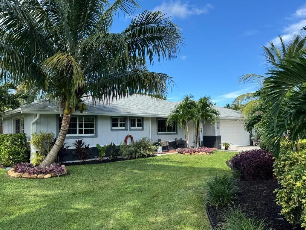 Photo of 3127 Lakeview Boulevard, Delray Beach, FL 33445 (MLS # R11130592)