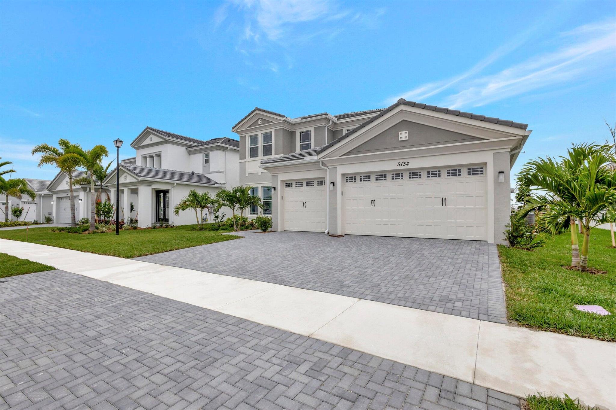 This Tanager Grand home is located in the Orchards of Westlake by Minto Communities. It is a 2 story, 7 BEDROOM home with master on first floor, 5.5 bathrooms, a den, loft and 3 car garage. The home is situated on a beautiful water homesite! Your new home features include impact windows and doors, quartz countertops, 42'' white cabinets in kitchen, double wall oven, gas range, gypcrete construction, window treatments and soooo much more! Come see this home today!