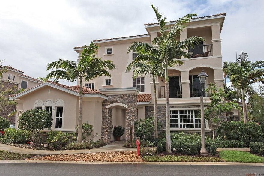 Rarely available end unit! Intracoastal carriage home with stunning views of the water. This luxurious 3 bedroom/2 bath/2 car garage carriage home has its own boat slip that can accommodate up to a 63ft boat. The condo  has been professionally decorated by The Design Group out of Naples Florida. This is the former model carriage home with over $200,000 builder upgrades. Furniture Negotiable. Frenchman's Harbor is located just minutes from the beach.