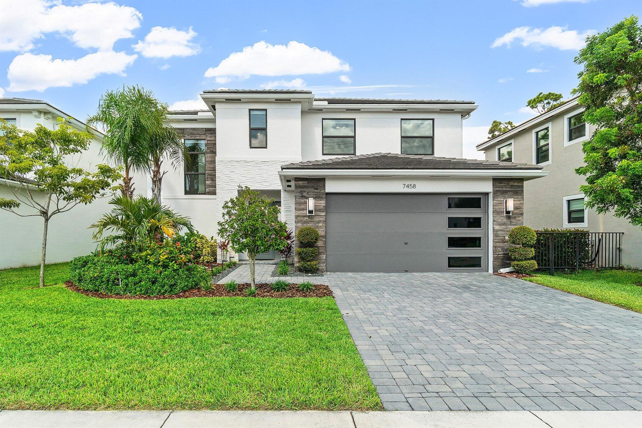 Welcome to 7458 Estero Drive, a beautifully maintained 4-bedroom, 3-bathroom two-story home located in the desirable gated community of Toscana Isles in Lake Worth. This spacious residence offers a bright and open floor plan with generous living areas, perfect for both everyday living and entertaining. The modern kitchen features stainless steel appliances, ample cabinetry, and a large island. One full bedroom and full bath with shower are conveniently located on the first floor--ideal for guests or a home office. Upstairs, you'll find the large primary suite with a walk-in closet and a spa-like en-suite bath, along with two additional bedrooms and another full bathroom. Additional highlights include a two-car garage, a private backyard, and access to resort-style amenities including a