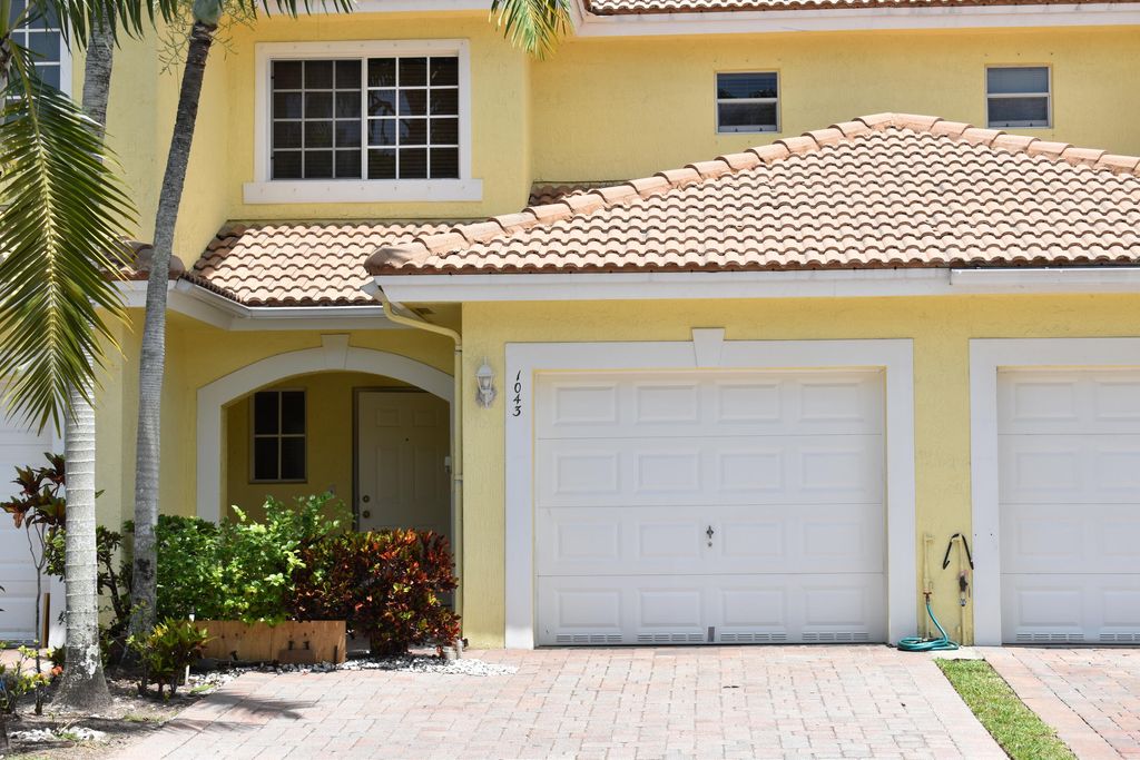 Photo of 1043 Imperial Lake Road, West Palm Beach, FL 33413 (MLS # B26027174)