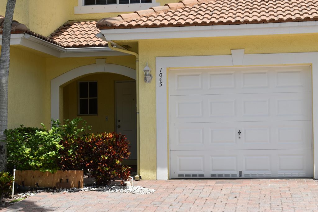 Photo of 1043 Imperial Lake Road, West Palm Beach, FL 33413 (MLS # B26027174)