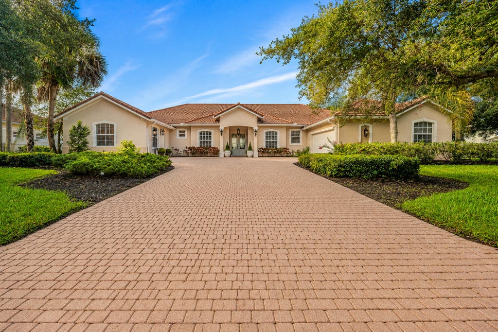 Photo of 1422 SW Osprey Cove, Port Saint Lucie, FL 34986 (MLS # B26074808)