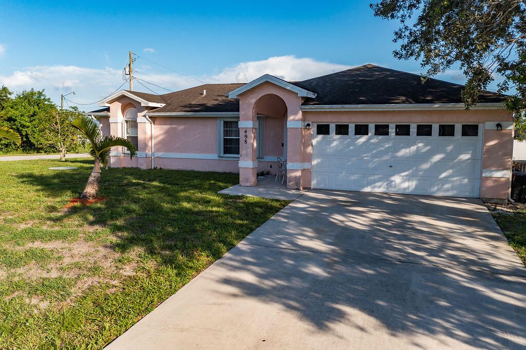 Photo of 498 SW Lairo Avenue, Port Saint Lucie, FL 34953 (MLS # R11008419)