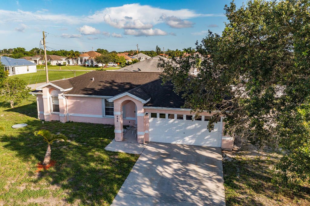 Photo of 498 SW Lairo Avenue, Port Saint Lucie, FL 34953 (MLS # R11008419)