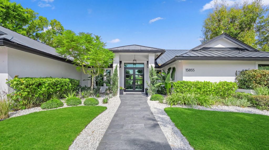 Photo of 15855 Meadow Wood Drive, Wellington, FL 33414 (MLS # R11163136)