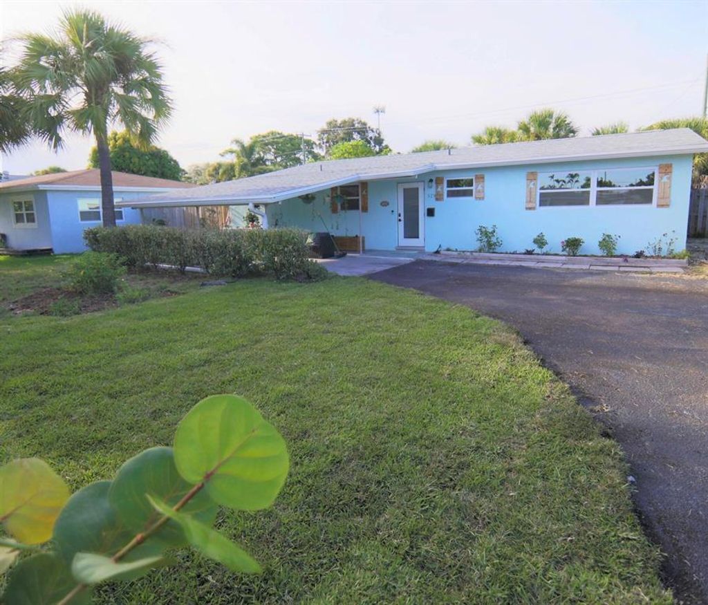 Photo of 529 Foresteria Drive, Lake Park, FL 33403 (MLS # R10873203)