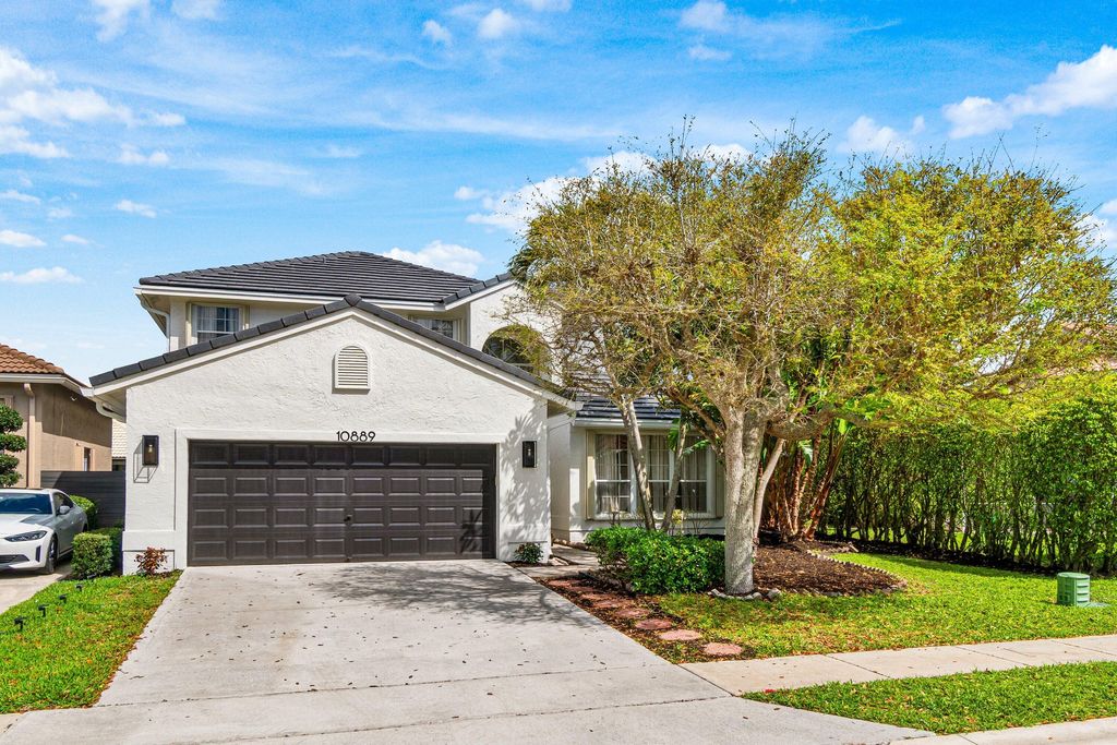 Photo of 10889 Tamoron Lane, Boca Raton, FL 33498 (MLS # B26005954)