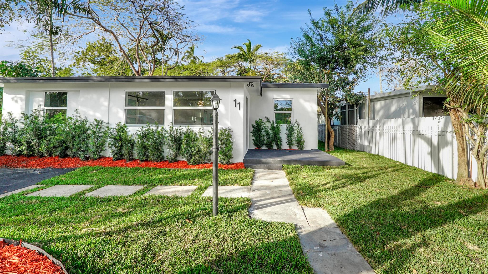 Beautifully remodeled 3 bedroom, 2 bathroom home located just minutes from Barry University, Miami Shores, Biscayne Park, and with quick access to I-95, the Turnpike, Downtown Miami, South Beach, and major airports.This 1,434 sq ft home sits on a spacious 7,000 sq ft lot and features an open floor plan filled with natural light. Enjoy a modern kitchen with Wi-Fi-enabled appliances, luxury vinyl plank flooring throughout, recessed lighting, and fully updated bathrooms.The private backyard is surrounded by lush tropical landscaping and offers plenty of space to relax or entertain. Located in a rapidly growing neighborhood, this home offers both style and convenience in a prime location
