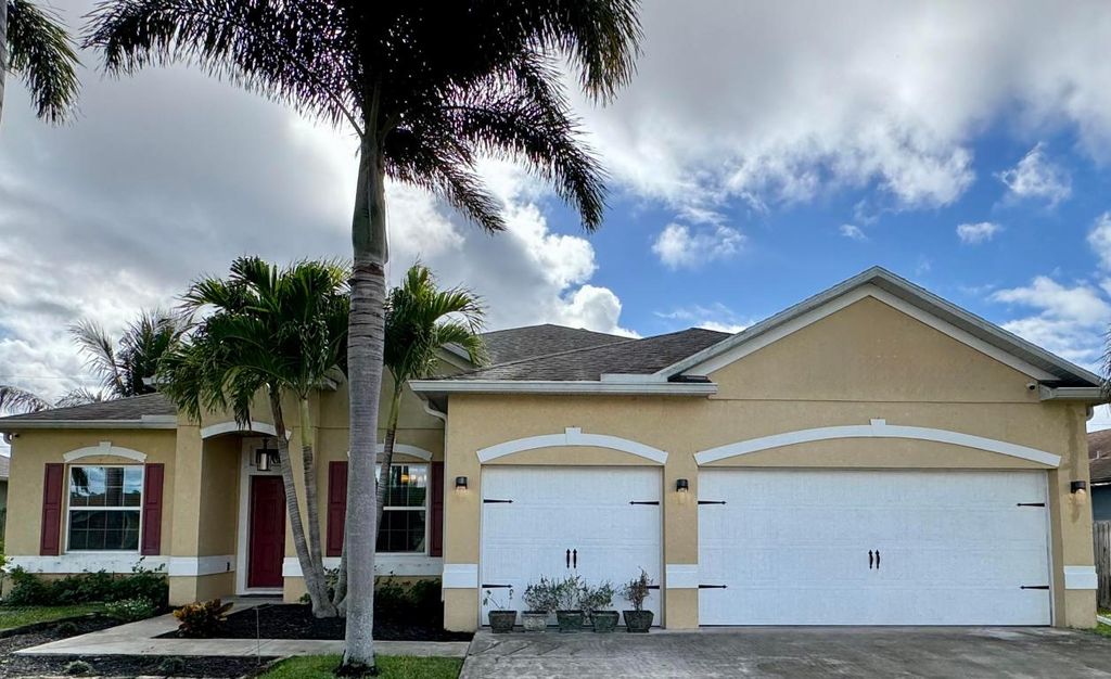 Photo of 520 SW Dailey Avenue, Port Saint Lucie, FL 34953 (MLS # R11144585)