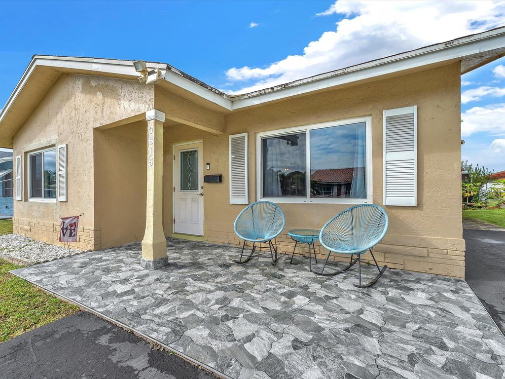 Photo of 7615 NW 68th Avenue, Tamarac, FL 33321 (MLS # R11164234)