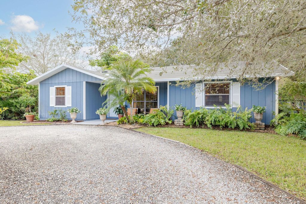 Photo of 7101 Coquina Ave, Fort Pierce, FL 34951 (MLS # R10947164)