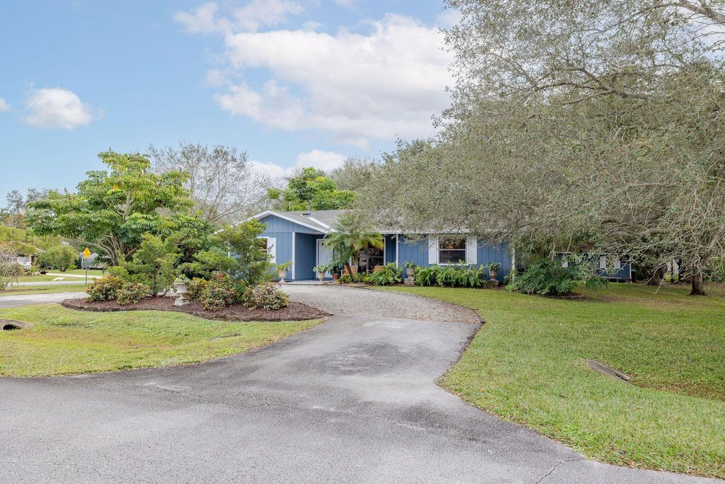 Photo of 7101 Coquina Ave, Fort Pierce, FL 34951 (MLS # R10947164)
