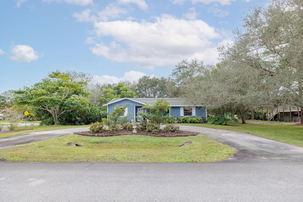 Photo of 7101 Coquina Ave, Fort Pierce, FL 34951 (MLS # R10947164)