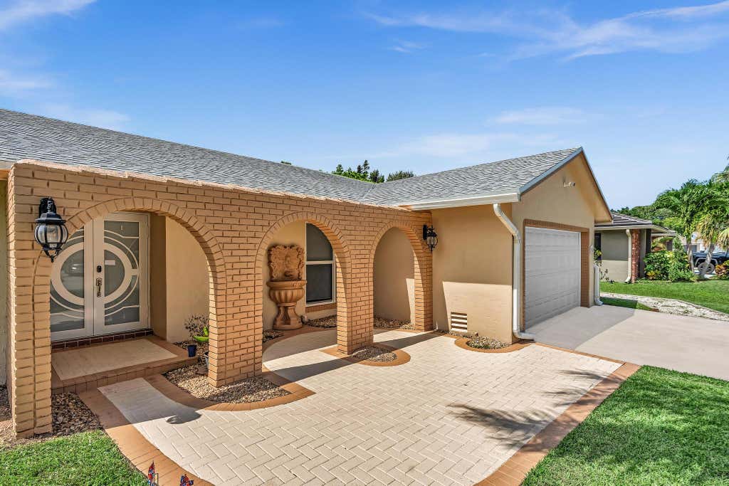 Photo of 3947 NW 22ND Street, Coconut Creek, FL 33066 (MLS # B26060387)