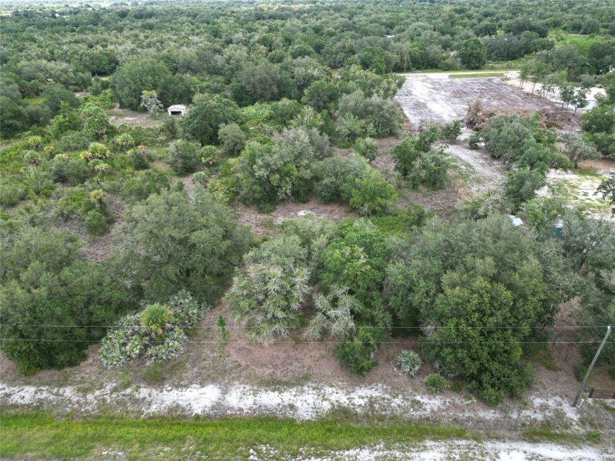 Build your own custom home or place a manufactured home! Beautiful 1.25 acre parcel in a country setting! high & dry!! No wetlands on the map! Flood zone X!  Lovely mature trees. Electric on this road! Enjoy nature and quiet living! The adjoining lot is also available for sale. Buy both and have 2.5 acres!