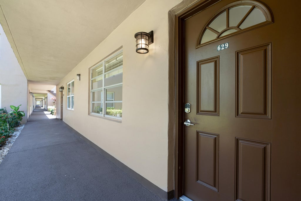 Photo of 629 Burgundy N, Delray Beach, FL 33484 (MLS # R10990153)