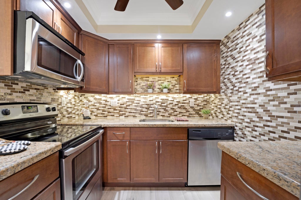 Photo of 629 Burgundy N, Delray Beach, FL 33484 (MLS # R10990153)