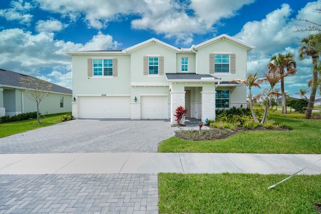 Photo of 12328 SW Roma Circle, Port Saint Lucie, FL 34987 (MLS # B26003538)