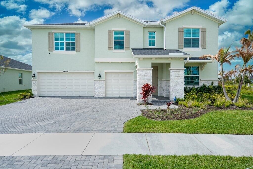 Photo of 12328 SW Roma Circle, Port Saint Lucie, FL 34987 (MLS # B26003538)