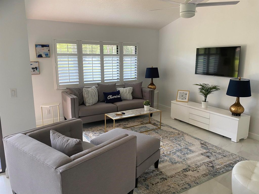 Photo of 6 Lexington Lane #D, Palm Beach Gardens, FL 33418 (MLS # R10994563)