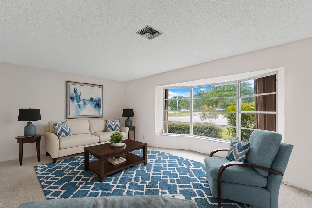 Photo of 8675 NW 28th Drive, Coral Springs, FL 33065 (MLS # R11134473)