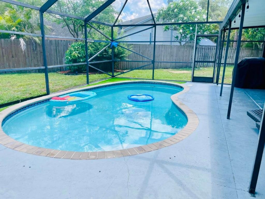 Photo of 1317 Periwinkle Place, Wellington, FL 33414 (MLS # R11128739)