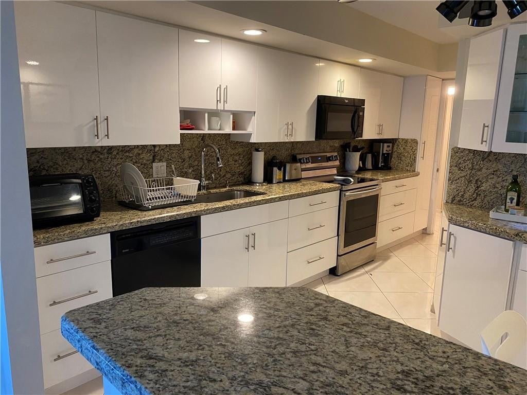Photo of 4900 N Ocean Boulevard #417, Lauderdale By The Sea, FL 33308 (MLS # F10517278)
