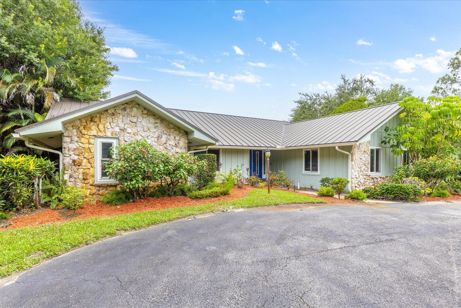 SPACIOUS Family Home in Gated Golf Community Crane Creek! 3BR/3BA on nearly 1.5 acres with top-rated schools, huge fenced yard, and safe and quiet streets. Open layout, chef's kitchen, cozy fire place, and large screened patio for family fun. Room to play, entertain and grow-plus impact windows, metal roof, and updated AC for comfort and peace of mind. Clean with a fresh coat of paint. Minutes to parks, shops and restaurants, and easy access to I-95 and turnpike. Golf membership is available but now required. Available to rent immediately!!!