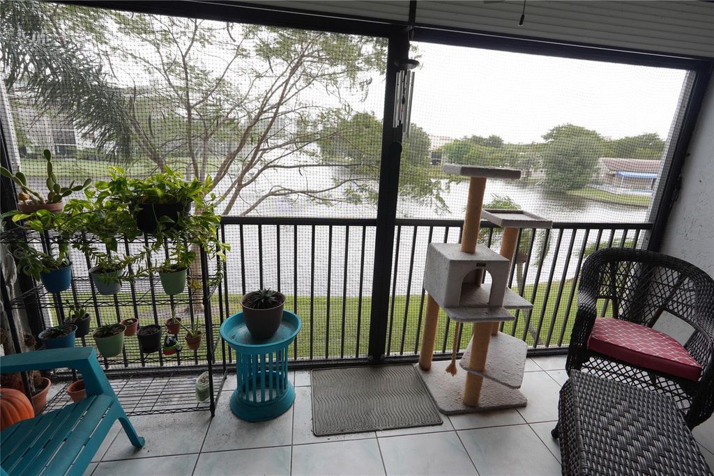 Photo of 2334 S Cypress Bend Drive #203, Pompano Beach, FL 33069 (MLS # F10417298)