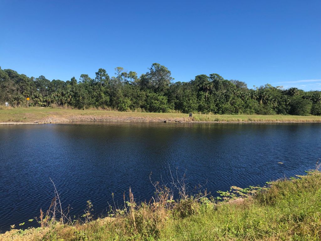 Photo of 2097 SW Import Drive, Port Saint Lucie, FL 34953 (MLS # R10855686)