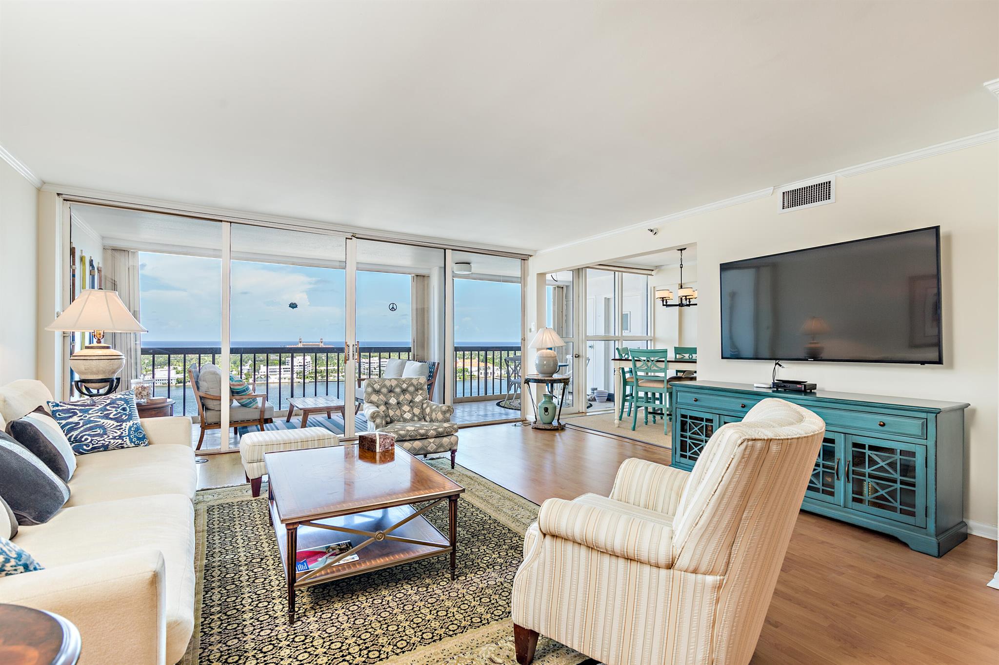 High floor with spectacular views of the Intracoastal and ocean, Palm Beach and the Marina, featuring very spacious rooms, a large covered terrace ideal for entertaining, en-suite master suite with city views, eat-in kitchen, a utility room and pantry. Private elevator foyer only shared by 2 units. The Waterview Towers is a First Class building with resort style amenities. Full Service Concierge, elegant renovated lobby, fitness center, dog park, terrace social space, pool, lighted tennis court, pickle ball, doormen, car valet, security, parking garage, bicycle storage, private storage. Manager on site. The downstairs marina offers dock space and service. Best location minutes from restaurants, shopping, beaches, Flagler Promenade, Royal Poinciana Plaza,