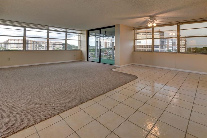 Rarely Available Corner Unit!!! Imagine walking into this well-lit unit and putting your own signature on it.  Drinking your morning coffee/tea out on your patio, watching the world around you. Look, there is the neighbour playing tennis again.  Time to get dressed.  Wow, I love my bedroom set in this big bright space.  And the closet... I don't have to worry about having enough room....I think there is a party this weekend. Is it at the pool or the clubhouse?