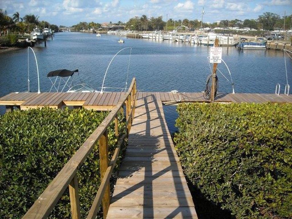 Photo of 725 Hummingbird Way #210, North Palm Beach, FL 33408 (MLS # B26020471)