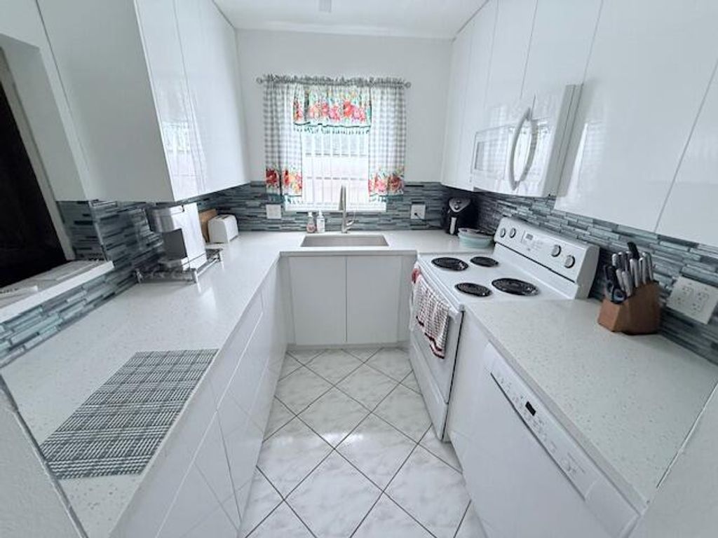 Photo of 41 Upminster B Crescent #B, Deerfield Beach, FL 33442 (MLS # B26014645)