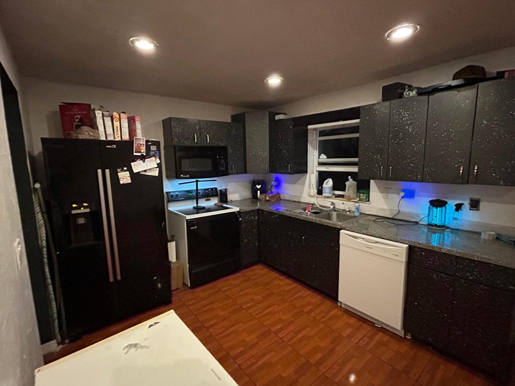 Photo of 2001 NW 2nd Street, Boynton Beach, FL 33435 (MLS # R11060424)