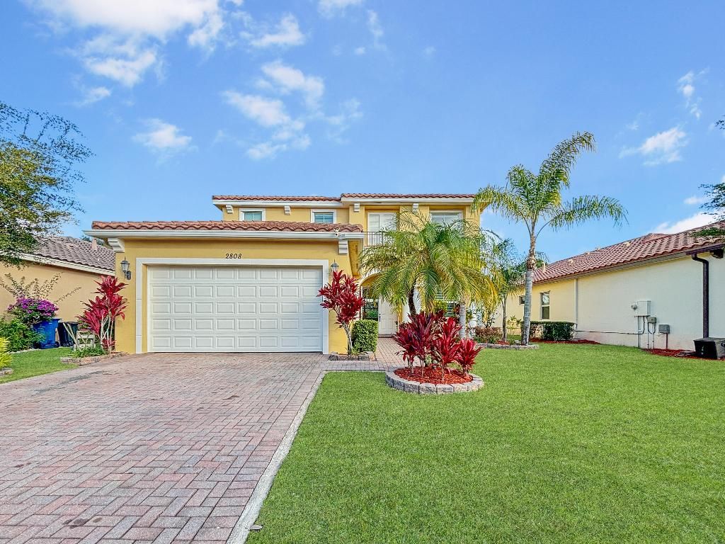 Photo of 2808 Bellarosa Circle, Royal Palm Beach, FL 33411 (MLS # R11153739)