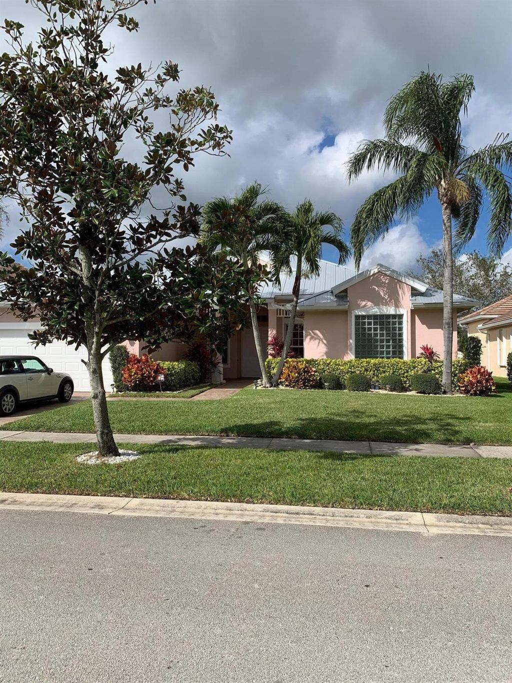 Photo of 137 NW Magnolia Lakes Boulevard, Port Saint Lucie, FL 34986 (MLS # R10768611)