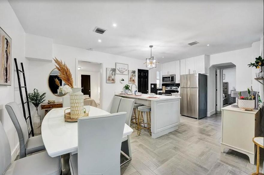 Owner financing available! Front home is a 2/1.5 newly remodeled unit fully furnished and ready to go turnkey. The outdoor area is inviting. There is also a back unit which is currently a 2 bed, 1 bath, but will need about $30K-40K of work to bring it up to code (by raising the floors). It is habitable as it is, but requires permit and work. The location is about 6 minutes from the beach and close to many hospitals which would work well for a furnished finder environment. Great opportunity for an investor, or someone looking for a home with opportunity for an in-law suite in the back. Easy to show.