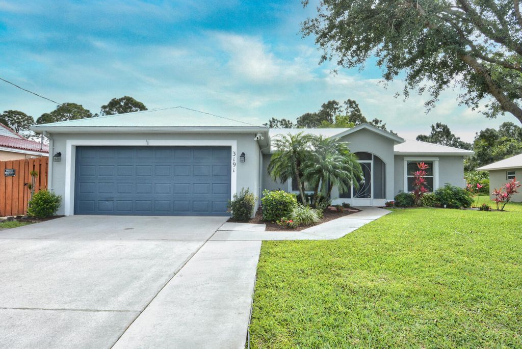 Photo of 3191 SW Hambrick Street, Port Saint Lucie, FL 34953 (MLS # R11081136)