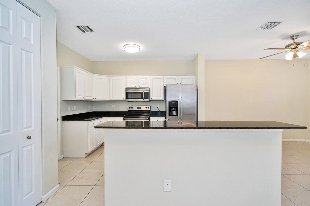 Photo of 4354 Emerald Vis Vis, Lake Worth, FL 33461 (MLS # R11036849)