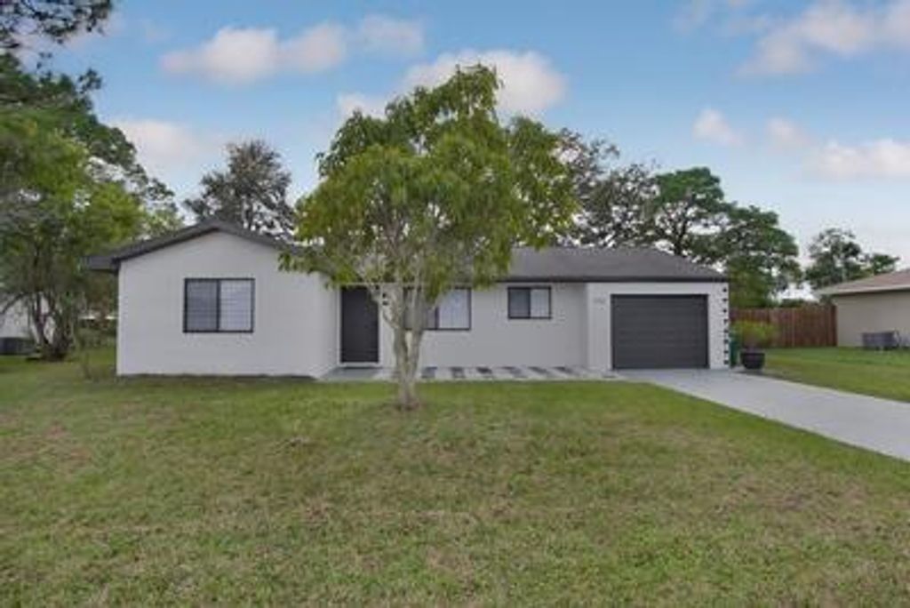 Photo of 2182 SE Genoa Street, Port Saint Lucie, FL 34952 (MLS # B26009719)