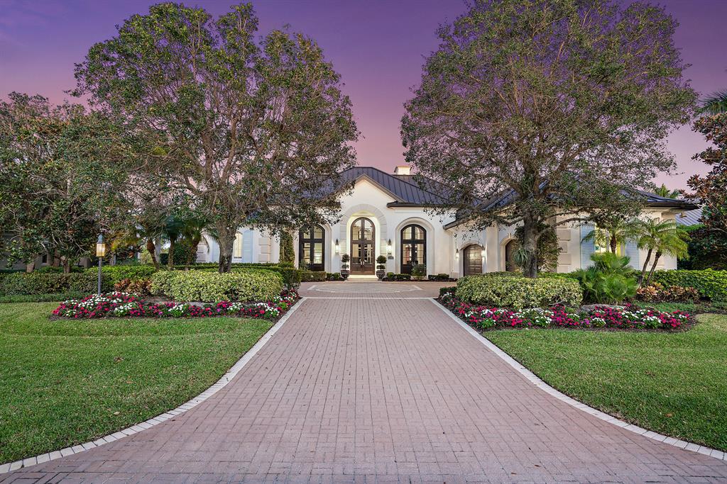 Spectacular former model by Purucker and Marrano Custom Homes in the award-winning gated community, Old Marsh Golf Club. A spacious outdoor living area and inviting pool overlook the 3rd hole of the Pete Dye Championship Golf Course. A most desirable rear eastern exposure offers great light throughout this single story masterpiece. Dual master baths and immaculate hardwood flooring highlight a gorgeous master suite. An elegant formal living room, intimate dining room and office/den all celebrate superior custom millwork and trim carpentry while the kitchen and family room are comfortable and inviting while overlooking the picturesque golf course. Separated from the golf course by water, the expansive and breathtaking views create a most desirable setting.