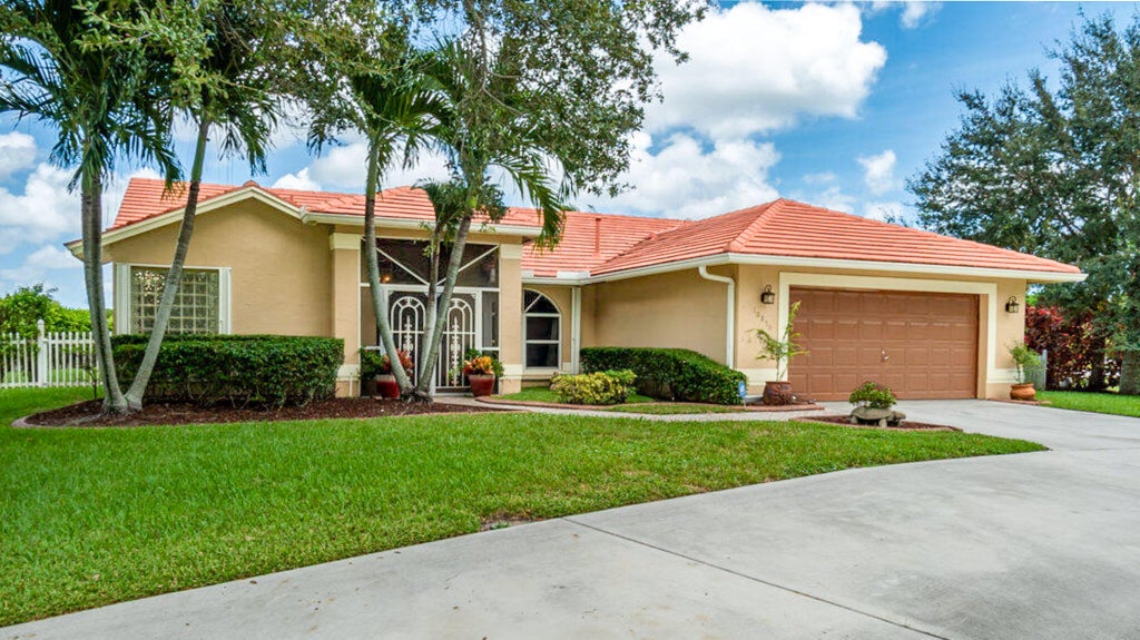Photo of 10850 Paso Fino Drive, Lake Worth, FL 33449 (MLS # B26062342)