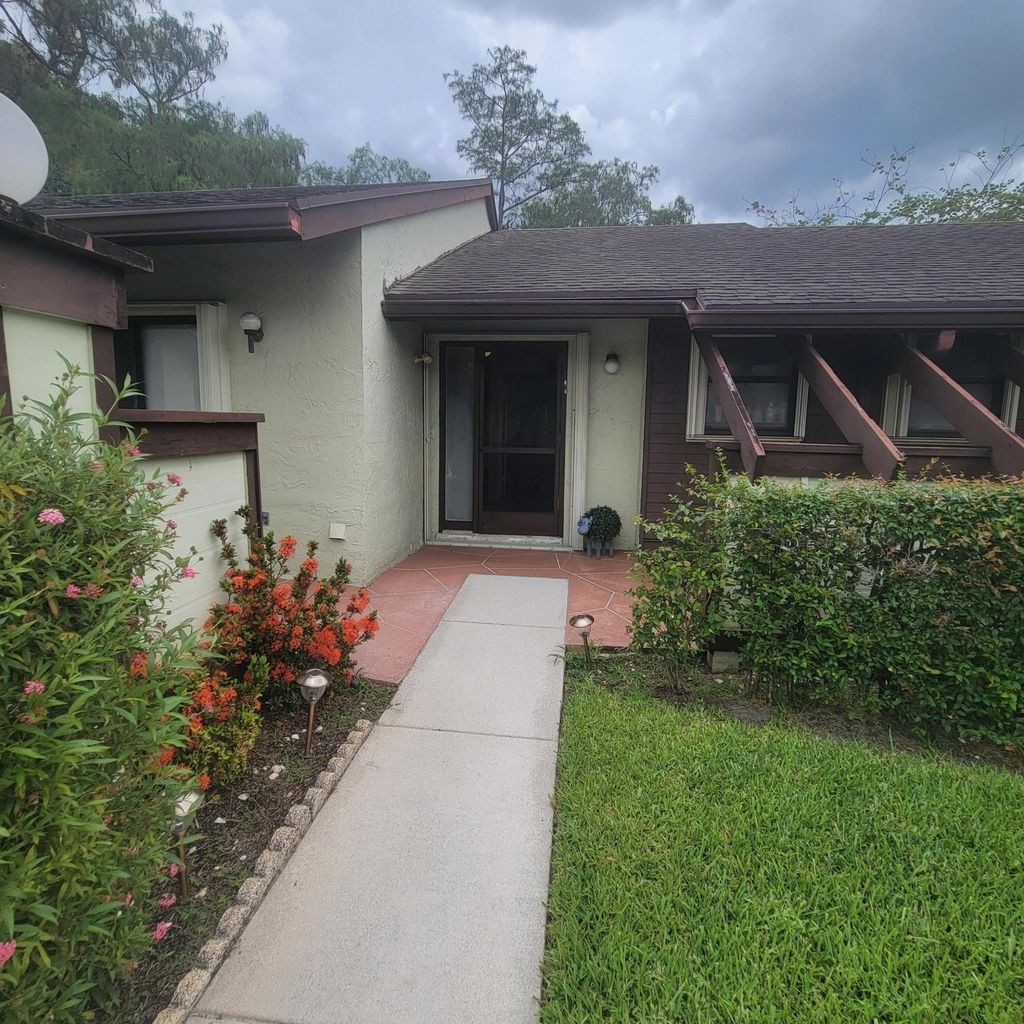 Photo of 238 Bald Eagle Court, Royal Palm Beach, FL 33411 (MLS # B26027803)